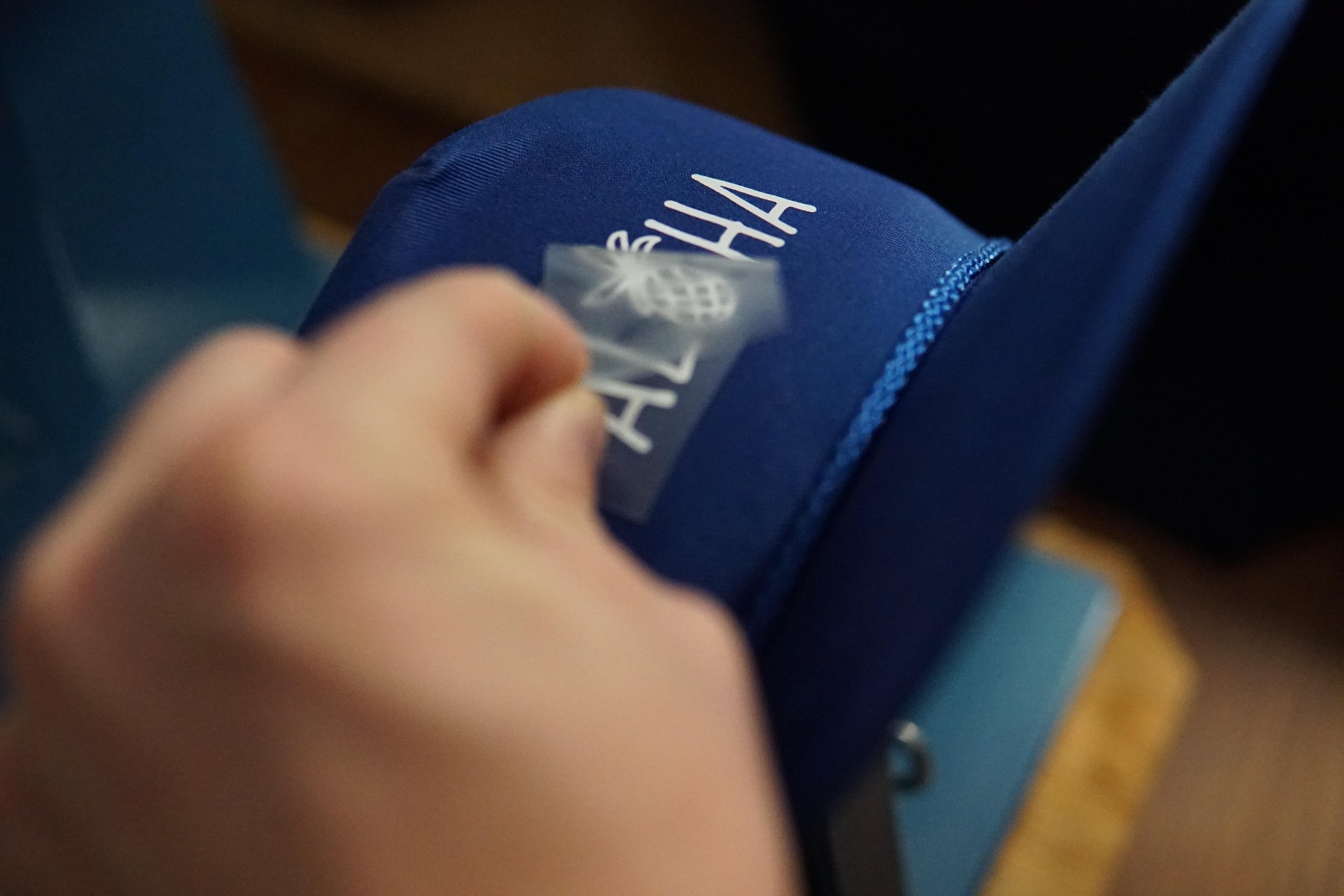 Close-up of Heat transfer heat transfer label showing flat printed surface and adhesive edge characteristics